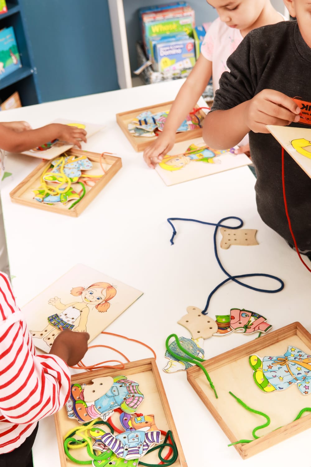 Wooden lacing puzzles